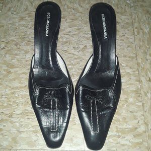 "BCBG MaxAzria Black Mules."